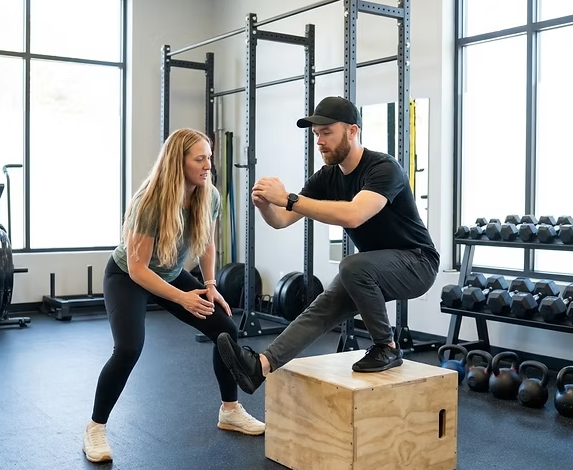 Athlete receiving personalized physical therapy movement assessment in Easley performance rehab clinic